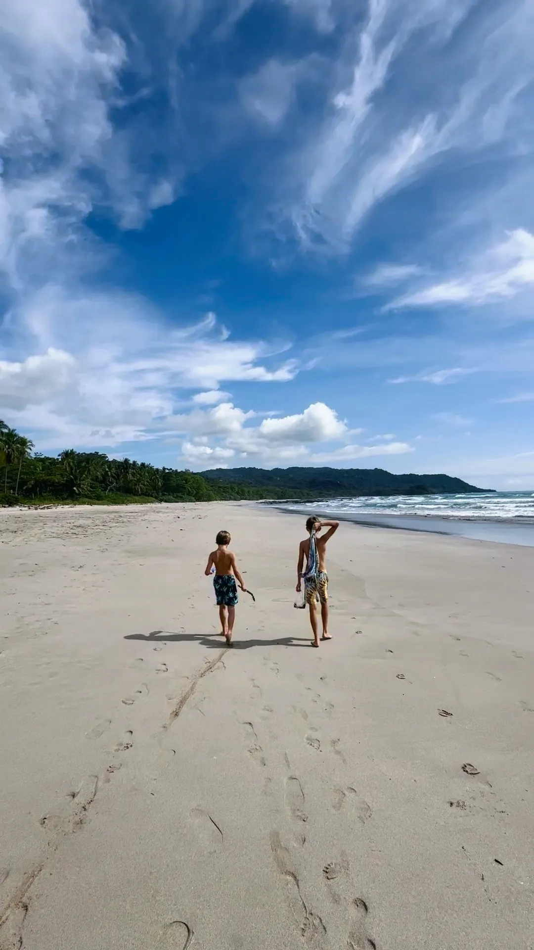 Walking the wide open beach near Peace Villa